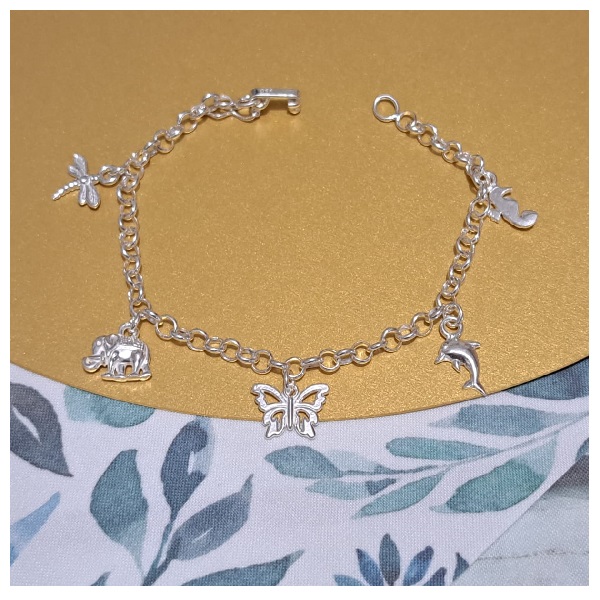 ag-pu03	Pulsera dijes 19cm, delfín, mariposa, caballito de mar, elefante y libélula Plata 950