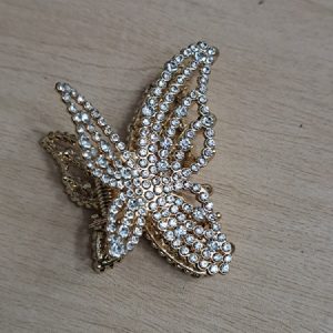 GMM-02 Ganchos Metálicos modelo Mariposa dorado
